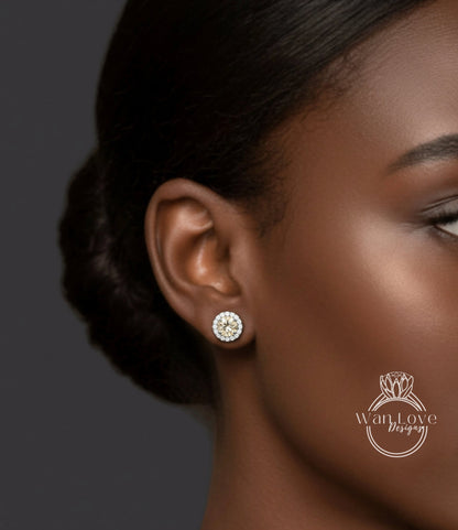 A close-up of a woman's ear with a diamond earring, against a dark background.
