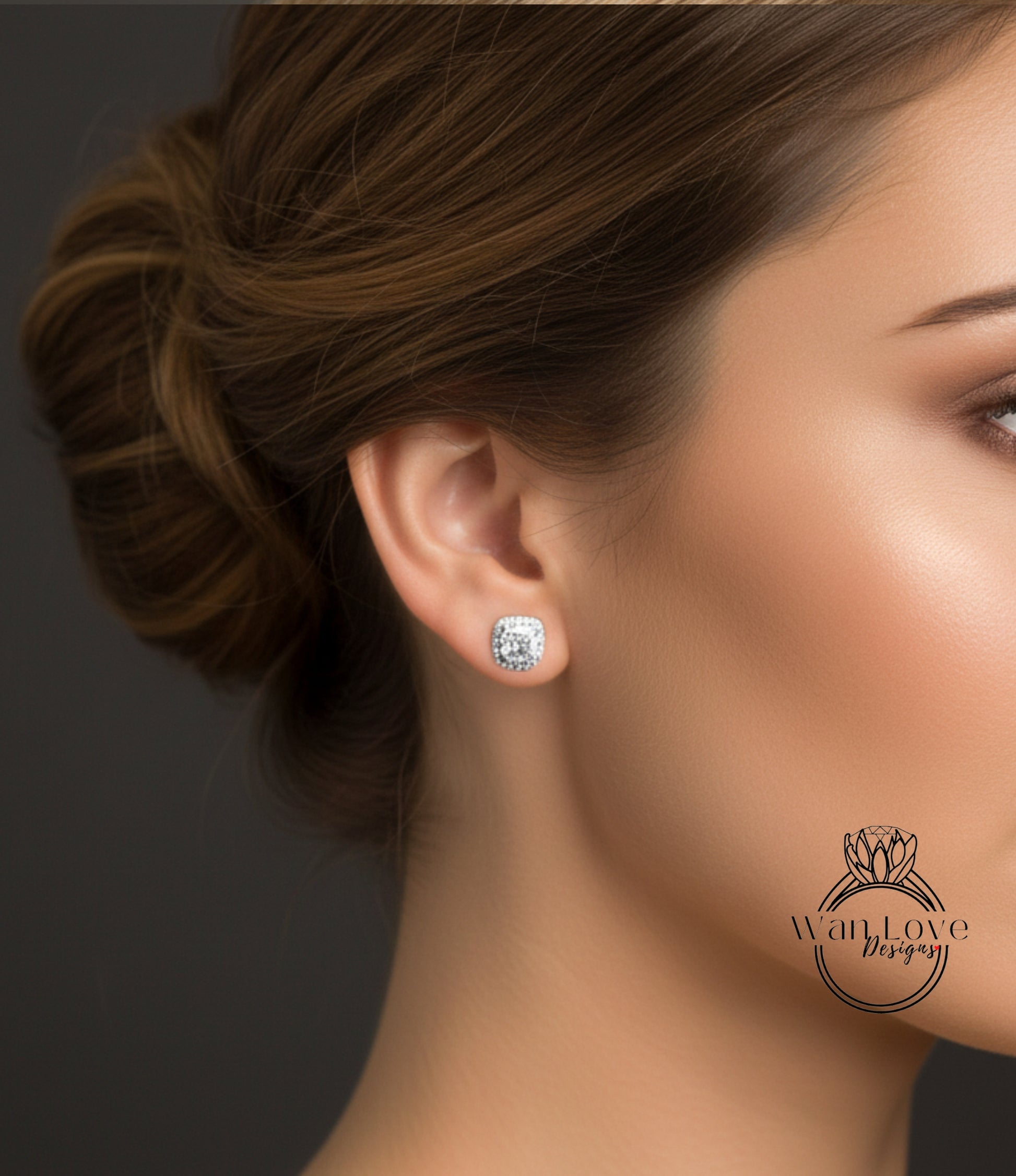 A close-up of a woman's face, focusing on her ear with a diamond earring.