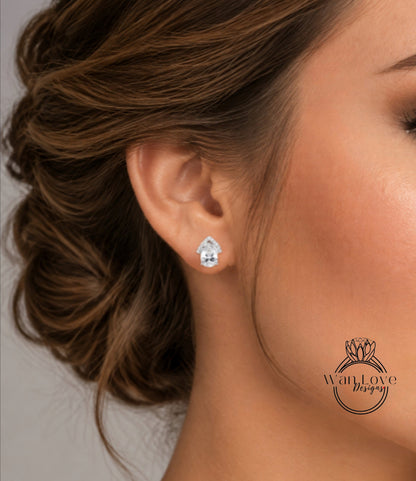 A close-up of a woman's face, focusing on her ear with a diamond earring.
