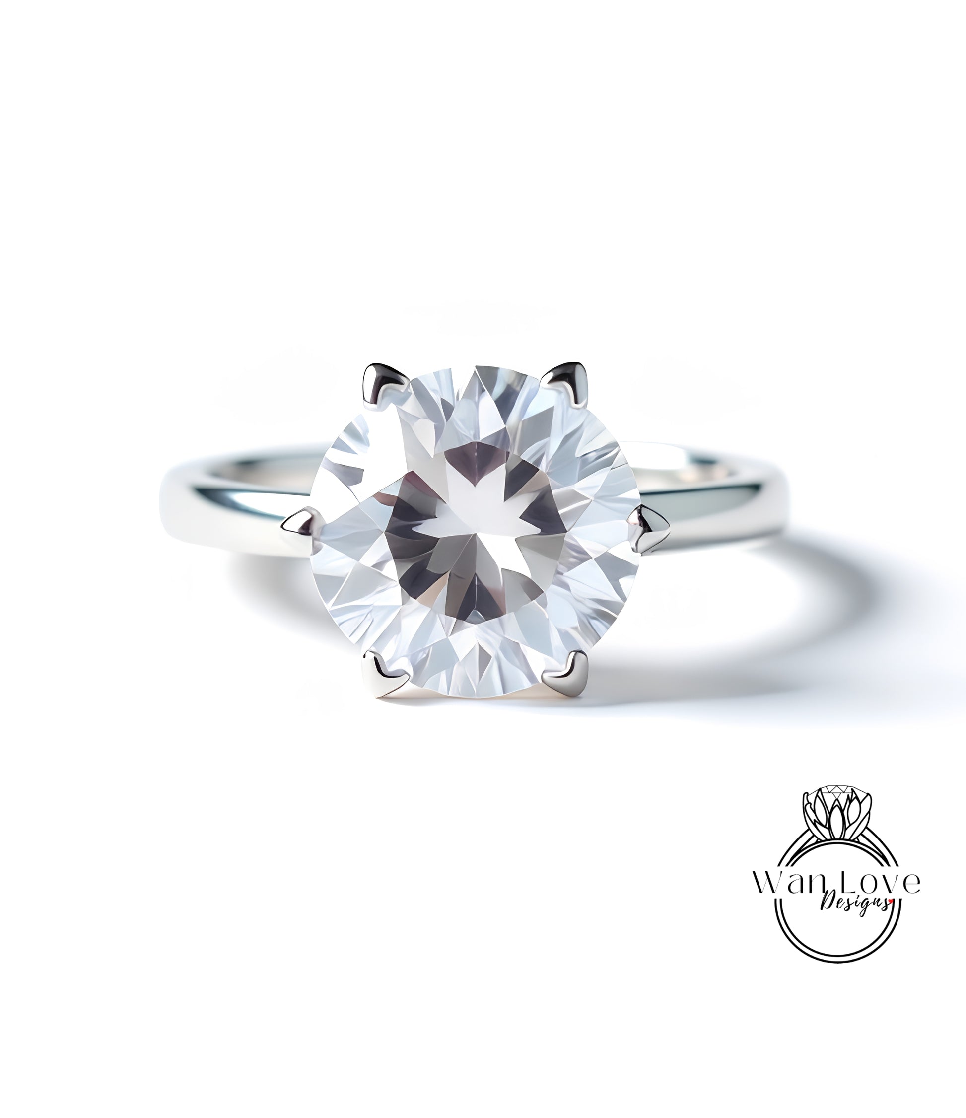 A close-up of a silver ring with a large, clear diamond set in the center.