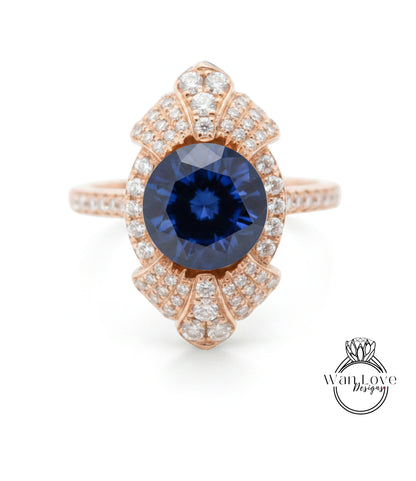 A stunning ring featuring a large blue gemstone surrounded by a sparkling diamond-encrusted design.