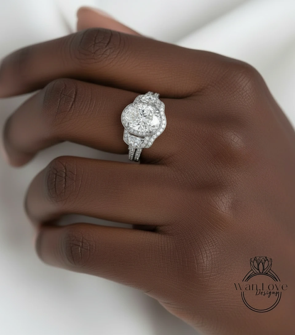 A close-up of a hand wearing a diamond engagement ring.