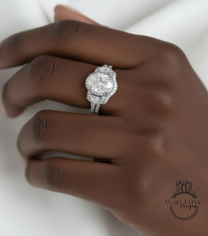 A close-up of a hand wearing a diamond engagement ring.