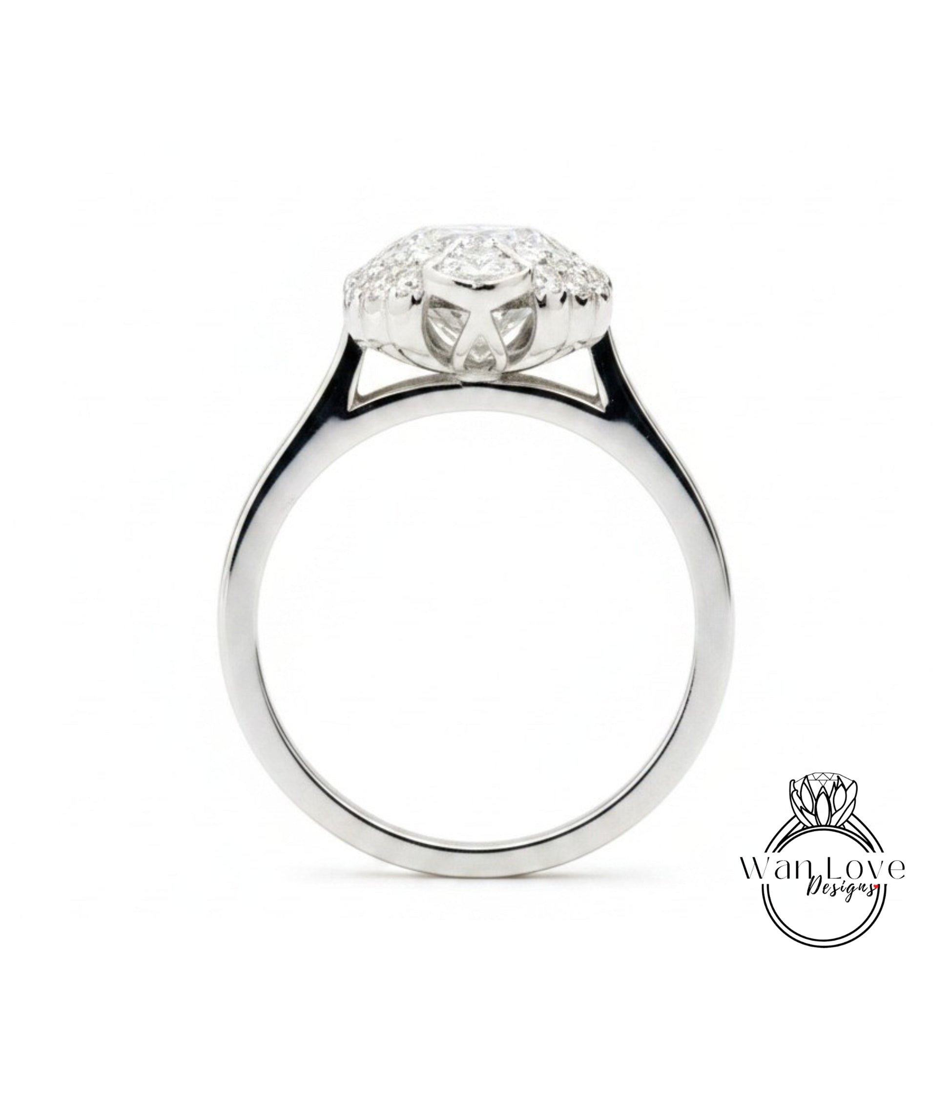 A silver engagement ring with a large central diamond surrounded by smaller diamonds.