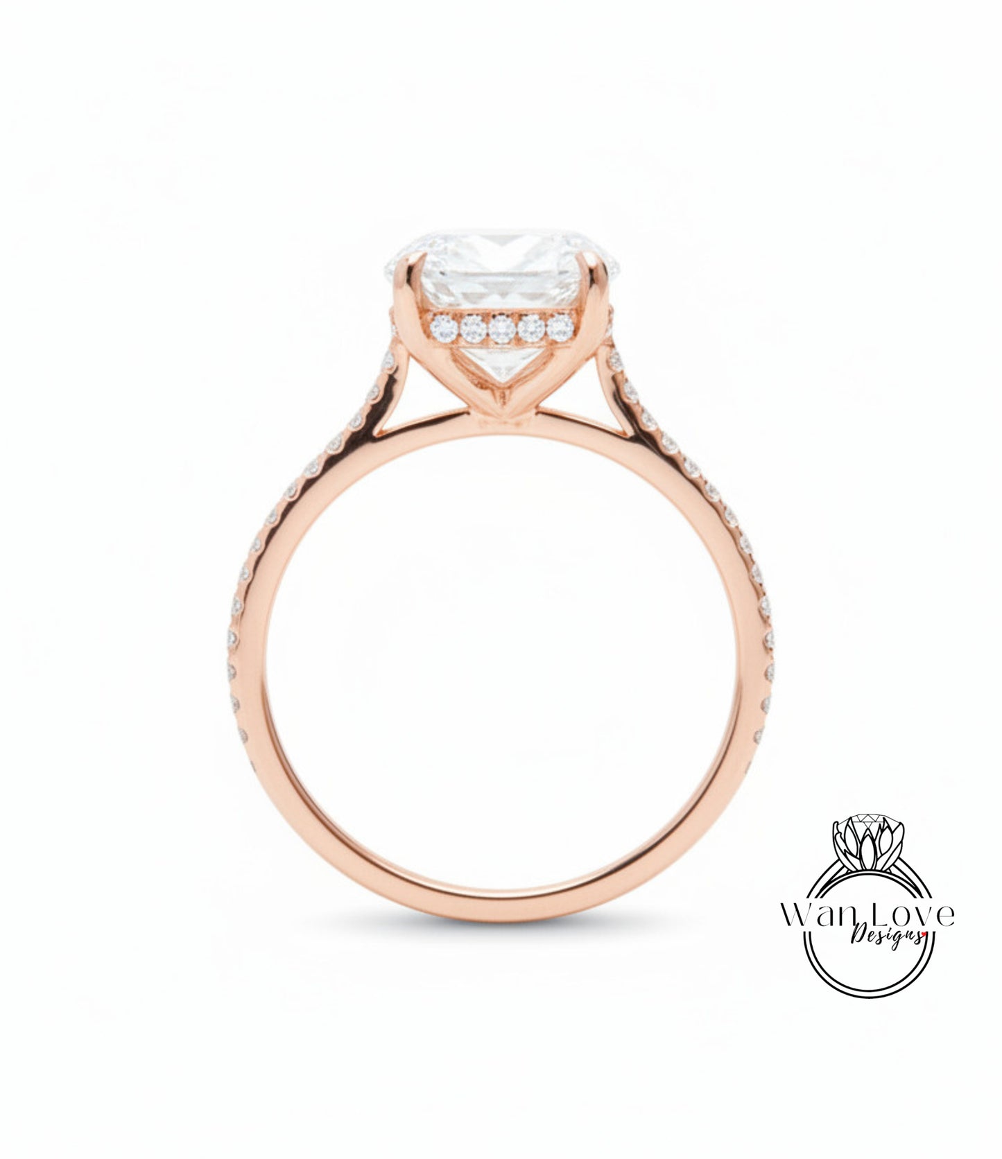 A rose gold engagement ring with a large central diamond and smaller diamonds around the band.