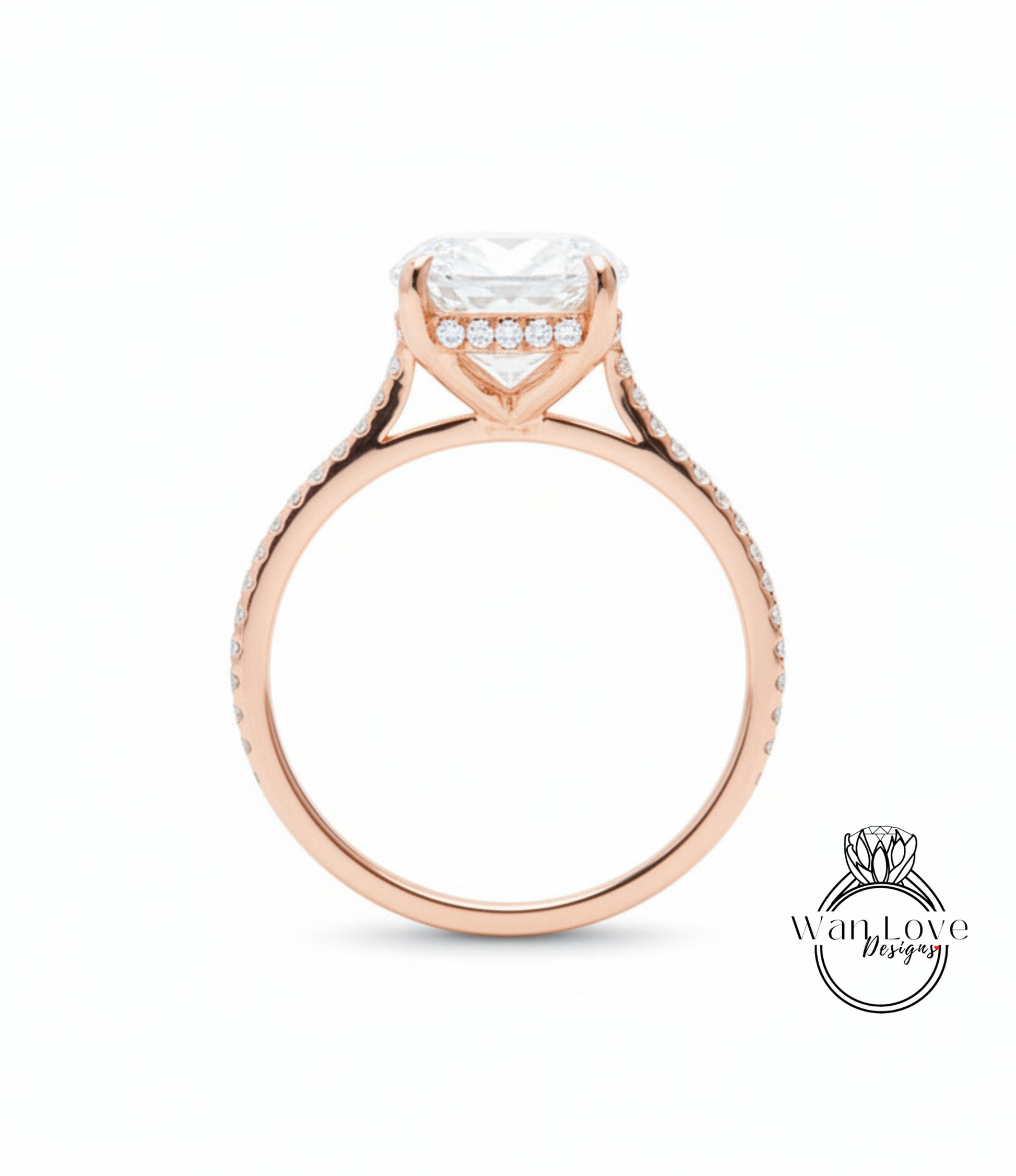 A rose gold engagement ring with a large central diamond and smaller diamonds around the band.