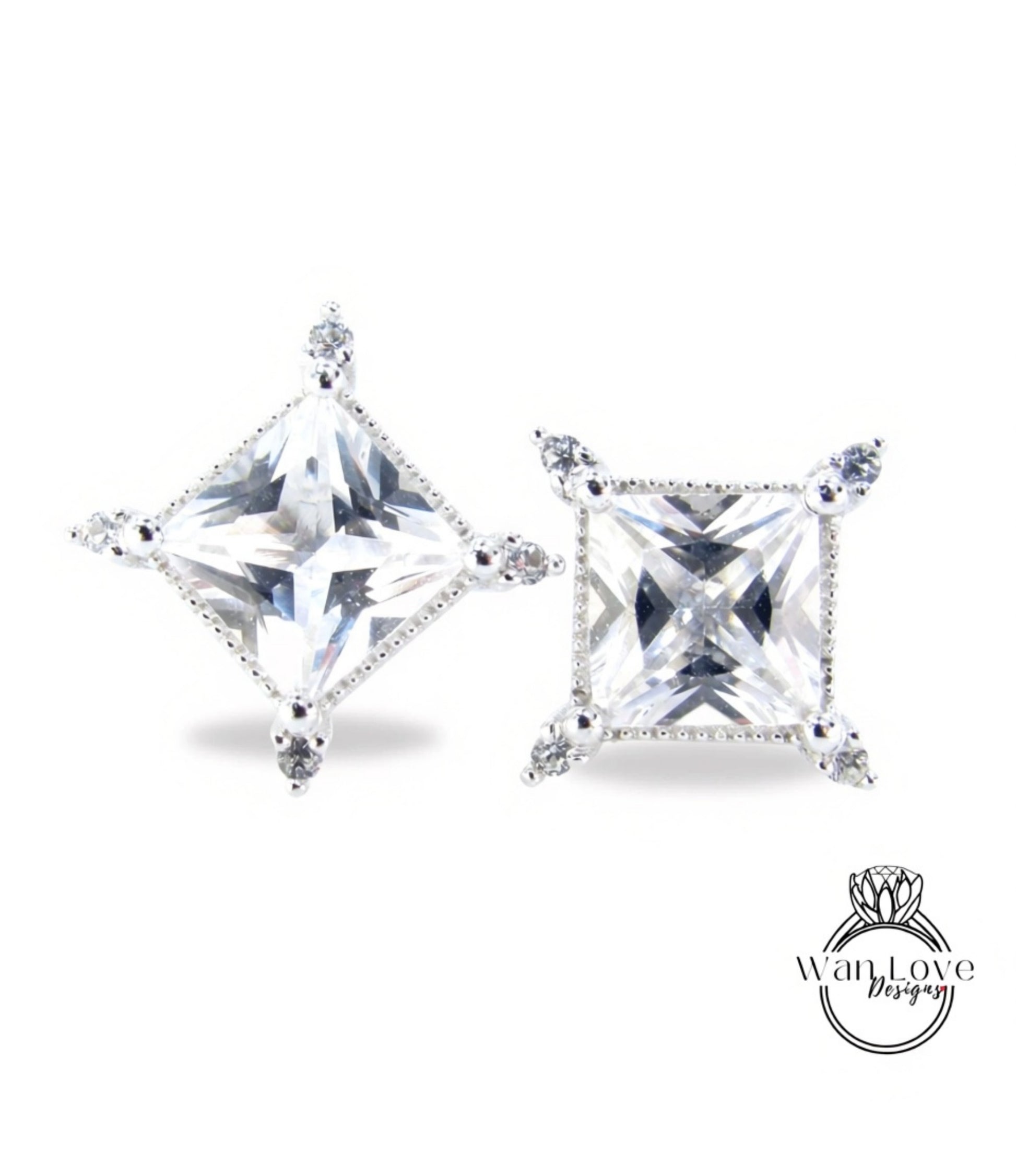two diamond-encrusted earrings with large, clear gemstones set in a square-shaped design.