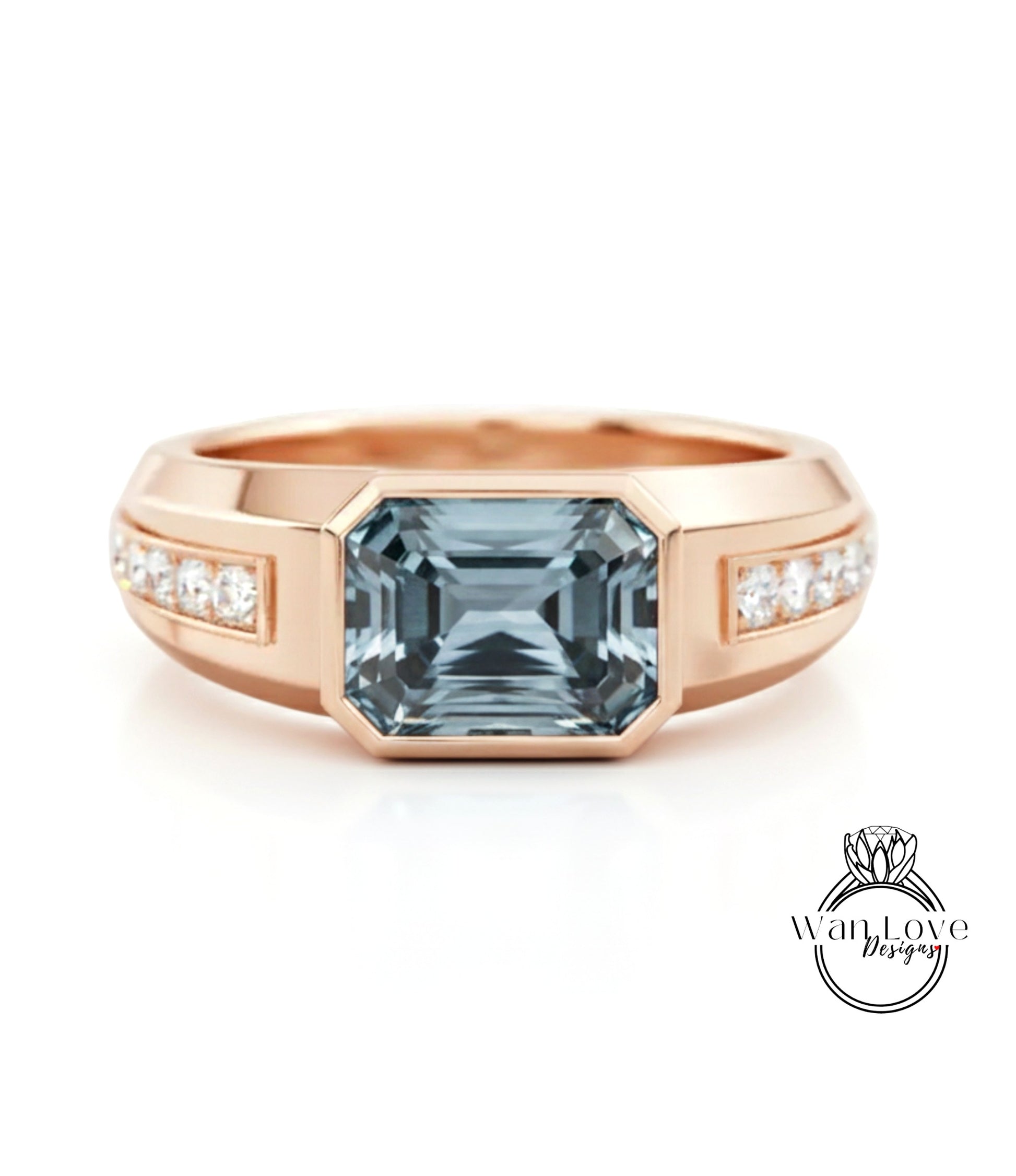 A gold ring with a large blue gemstone in the center, surrounded by smaller diamonds.