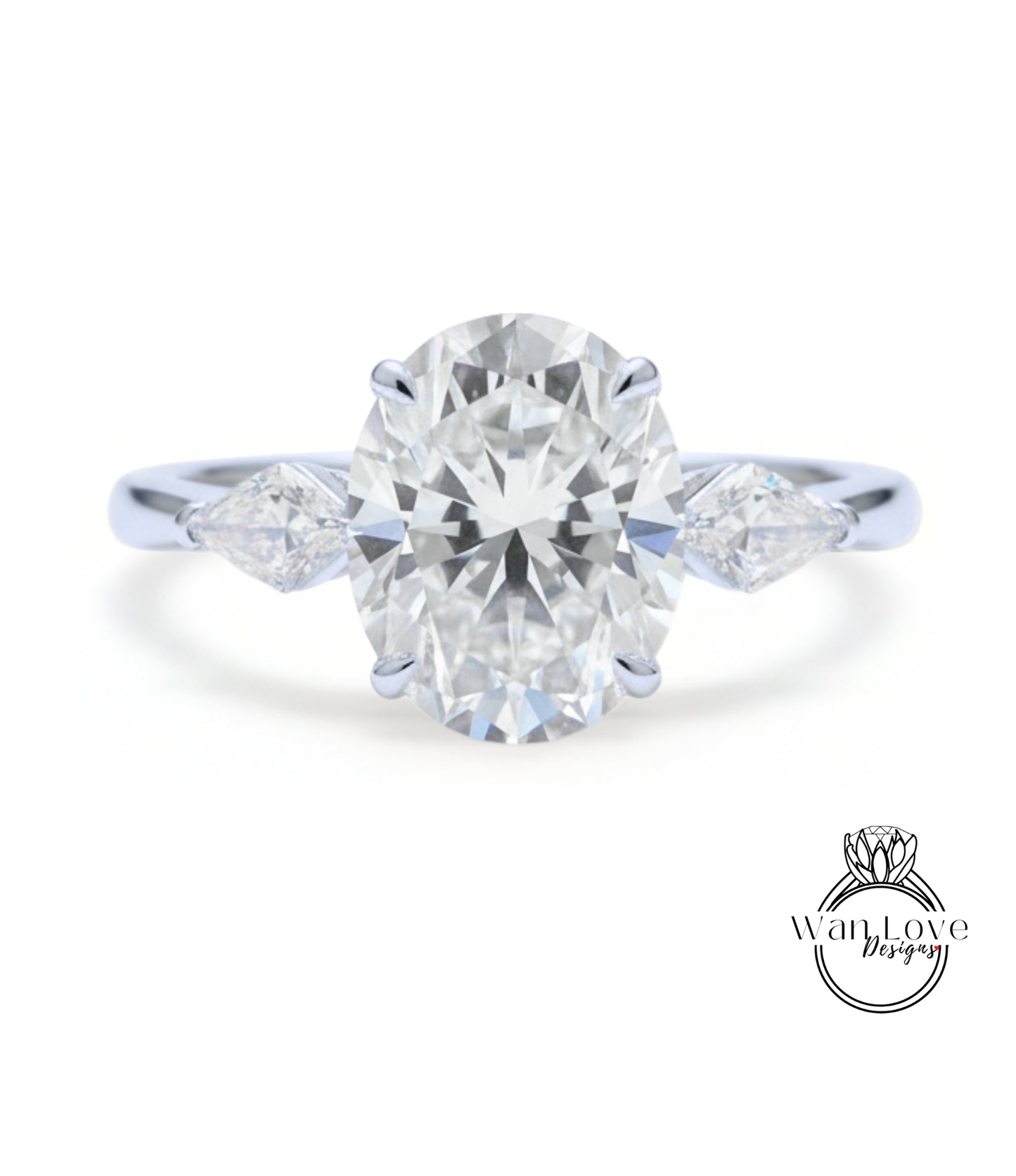 A close-up of a diamond engagement ring with a large oval-shaped diamond set in the center, surrounded by smaller diamonds on either side.