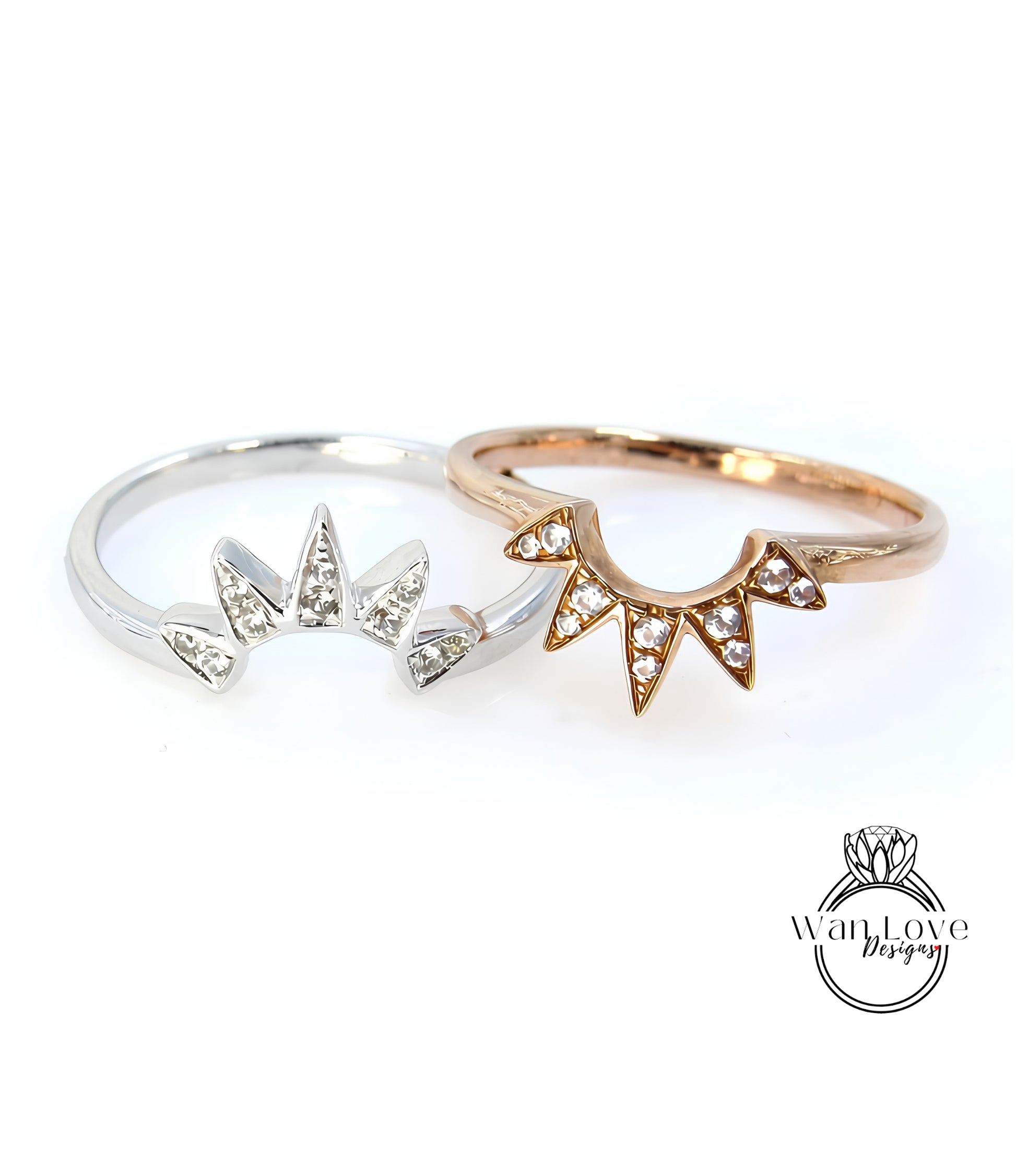 Two rings with gemstone designs are displayed against a white background.