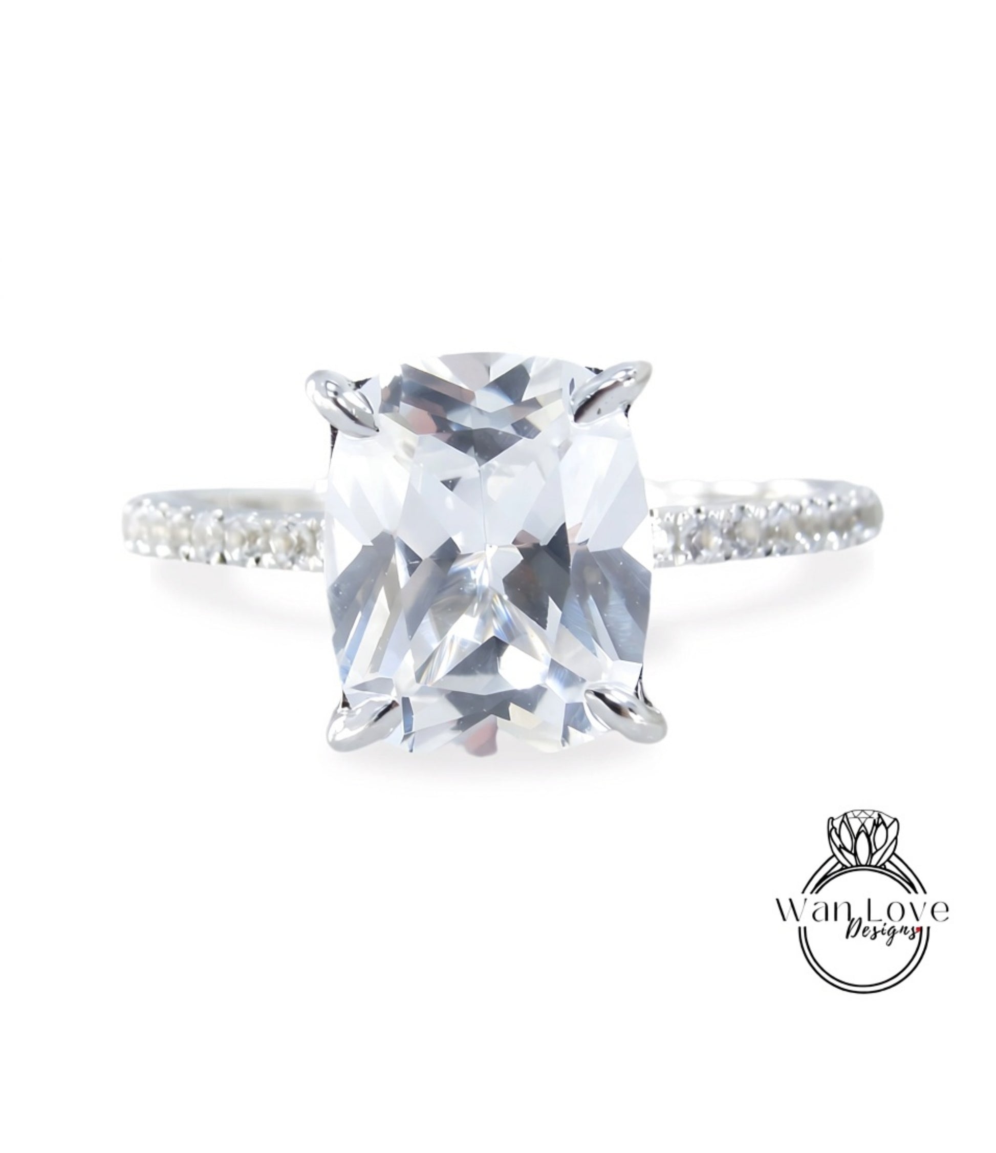 A close-up view of a diamond engagement ring with a large, clear gemstone set in a silver band.