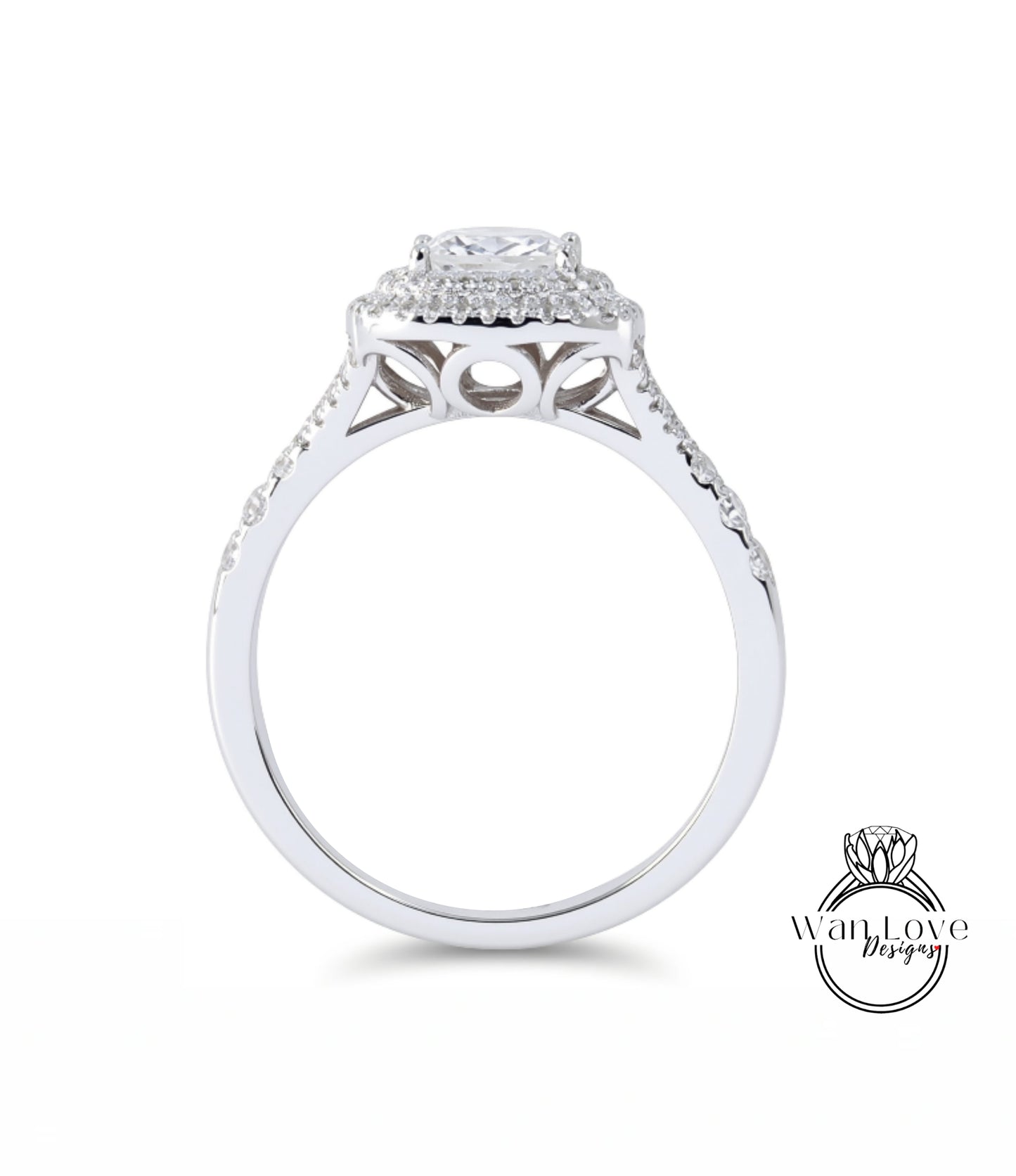 A silver engagement ring with a large central diamond surrounded by smaller diamonds, set in a halo of smaller diamonds.
