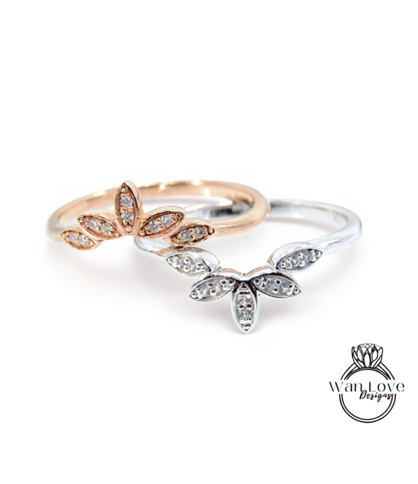 two rings with flower-shaped stones on them.