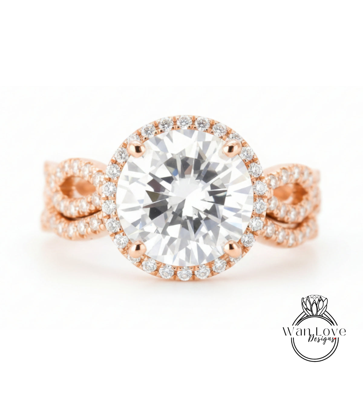 A close-up image of a beautiful engagement ring with a large, round diamond set in a halo of smaller diamonds, surrounded by a delicate, twisted band of gold.