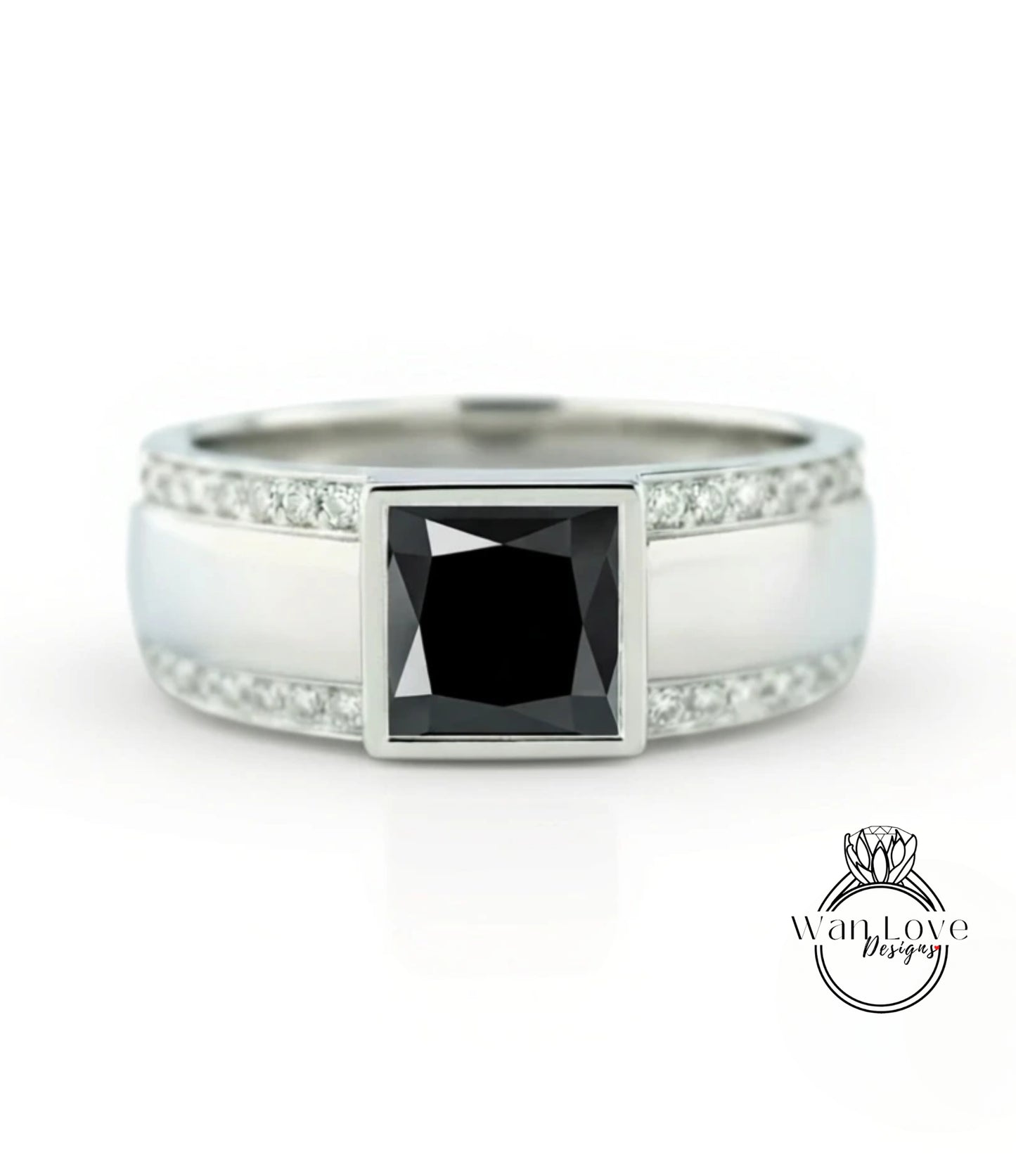 A silver ring with a large black diamond as the centerpiece, surrounded by smaller diamonds.
