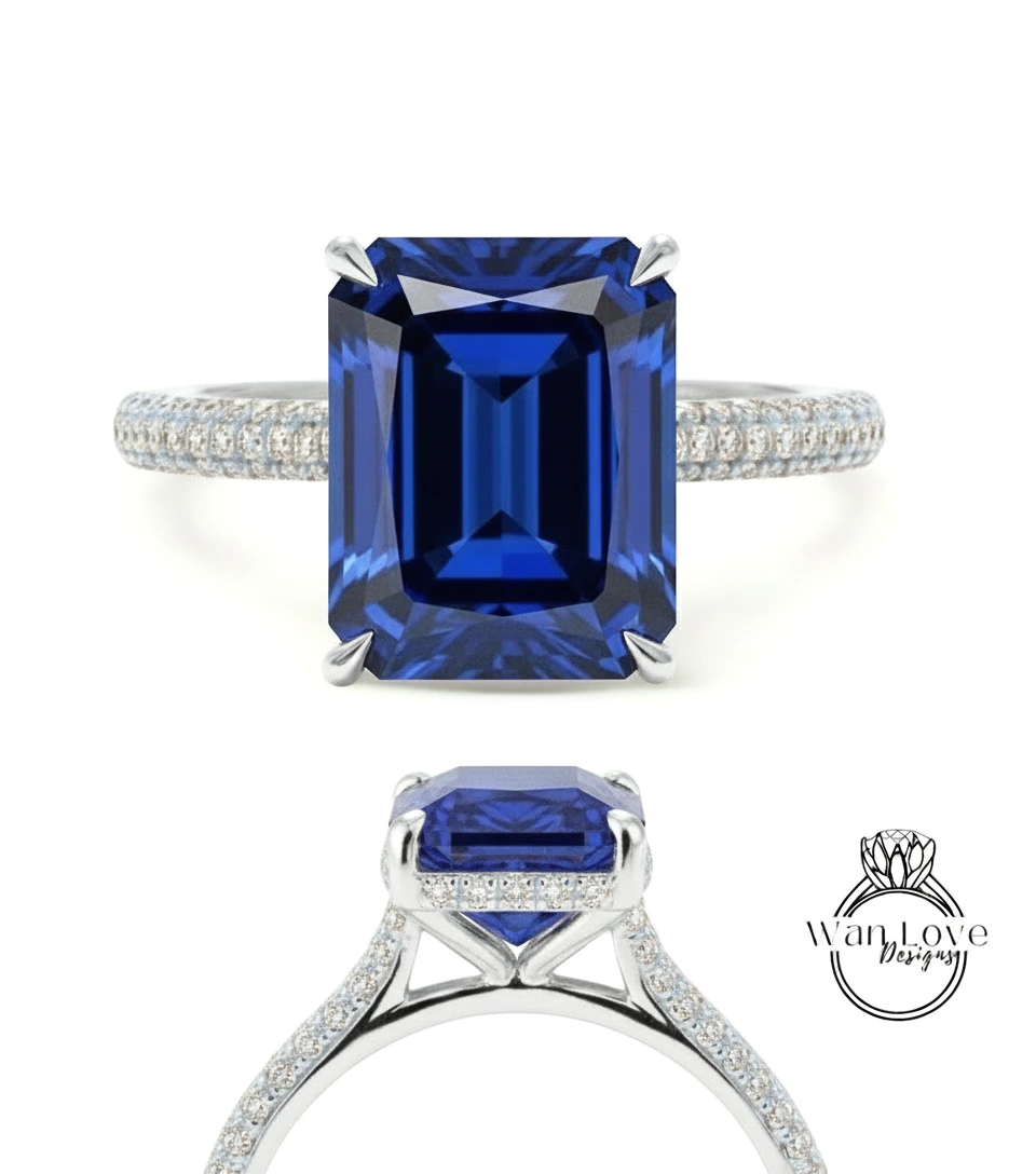 A stunning blue sapphire engagement ring with a large central gemstone surrounded by smaller diamonds set in a silver band.