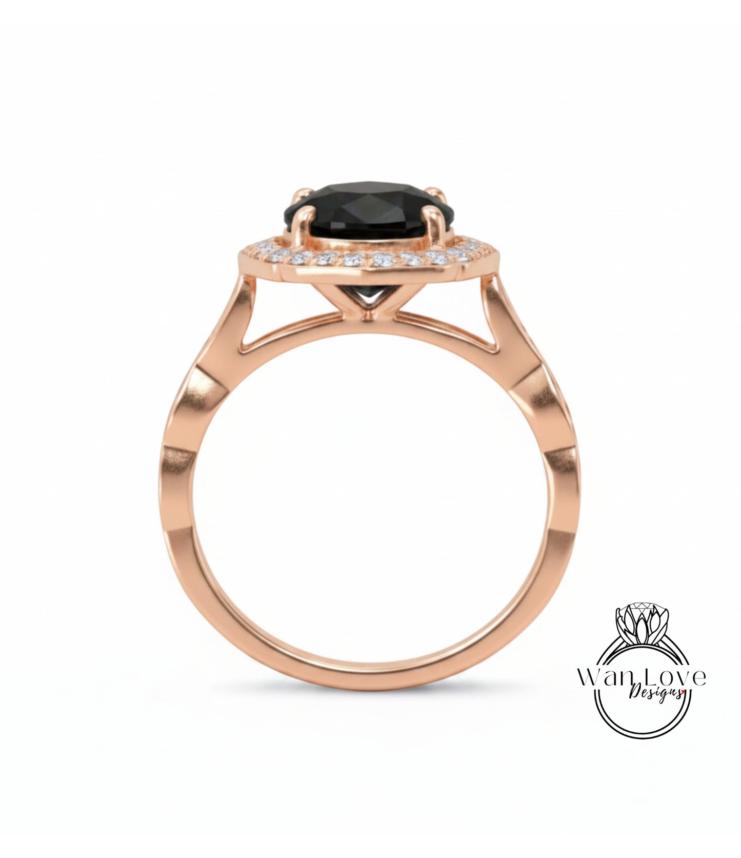 A rose gold ring with a large black gemstone set in the center, surrounded by smaller diamonds.