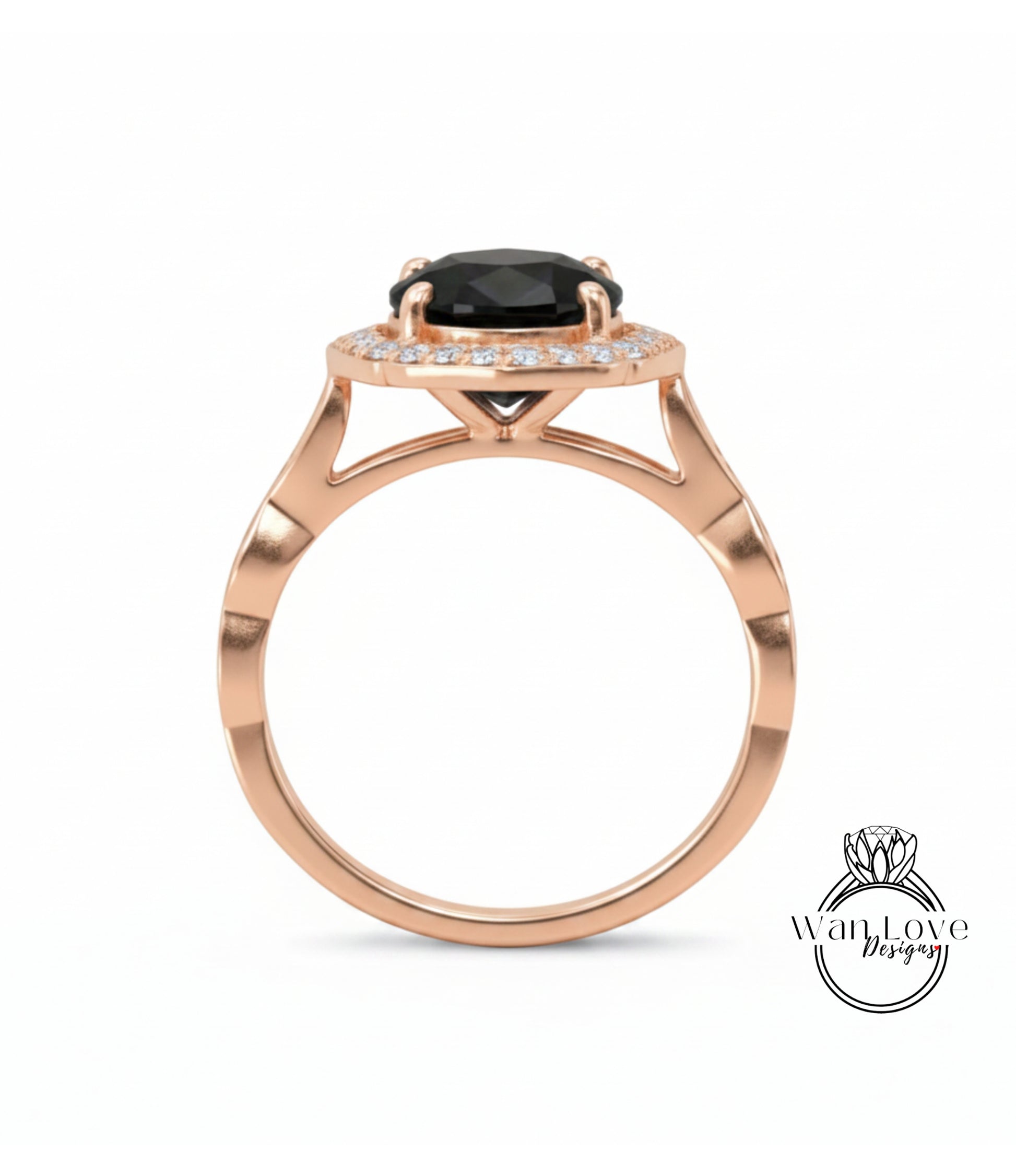 A rose gold ring with a large black gemstone set in the center, surrounded by smaller diamonds.