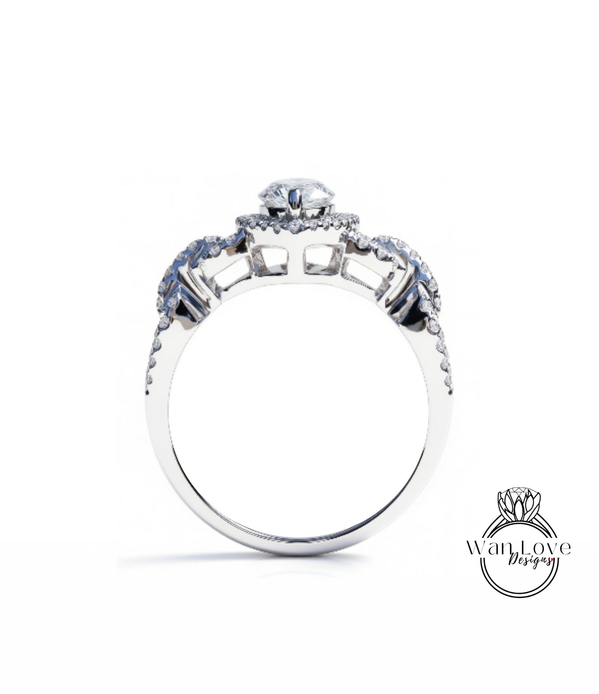 A silver engagement ring with a large central diamond surrounded by smaller diamonds on either side.