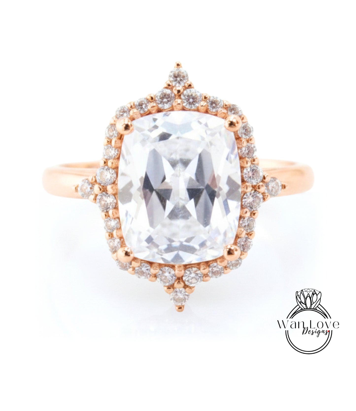 A large, clear gemstone ring with a halo of smaller diamonds around the center stone.