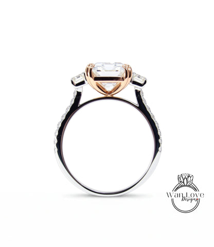 A close-up view of a silver ring with a large, clear gemstone set in the center.