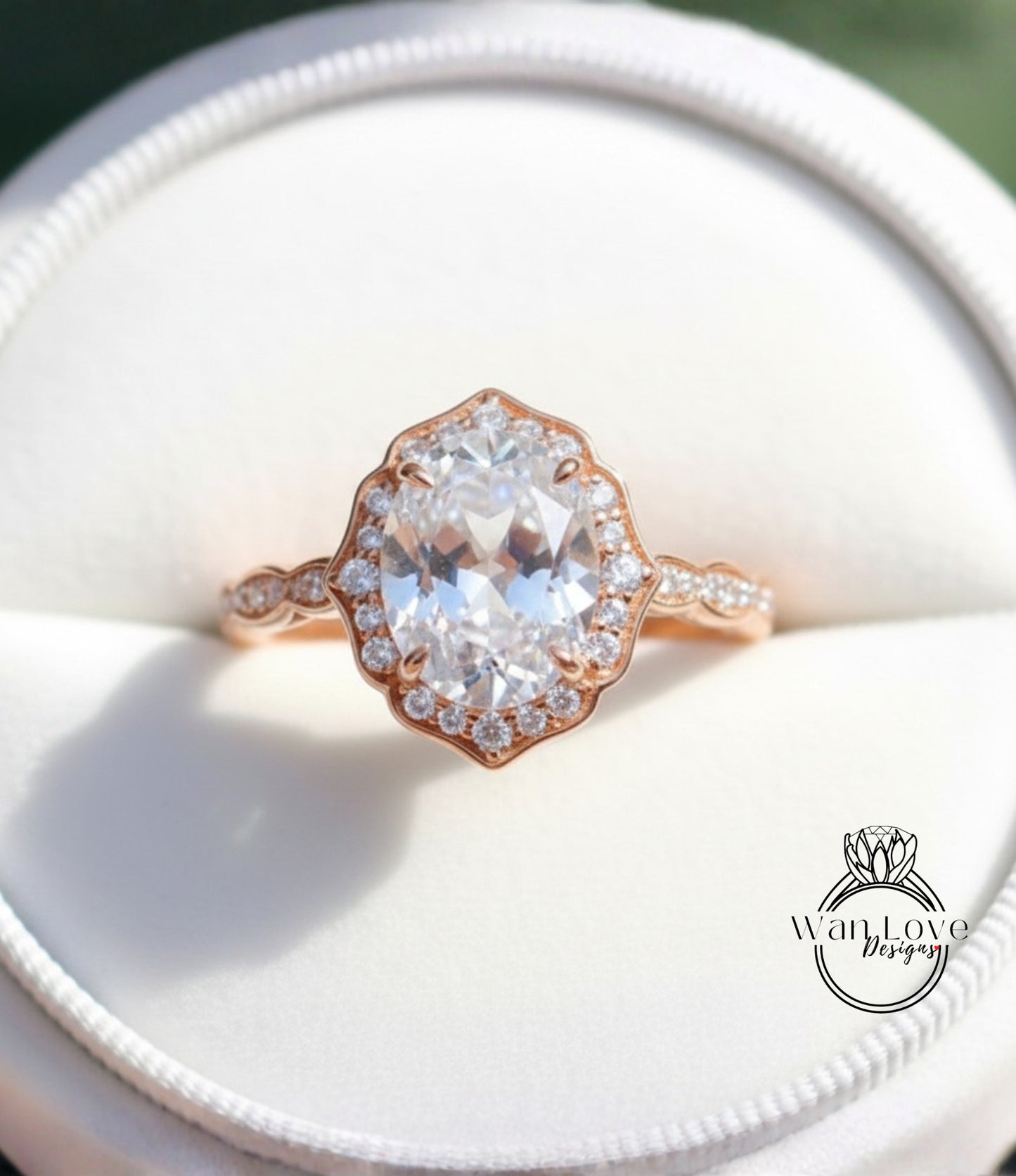 A close-up view of a beautiful diamond engagement ring, showcasing a large oval-shaped diamond surrounded by smaller diamonds set in a rose gold band.