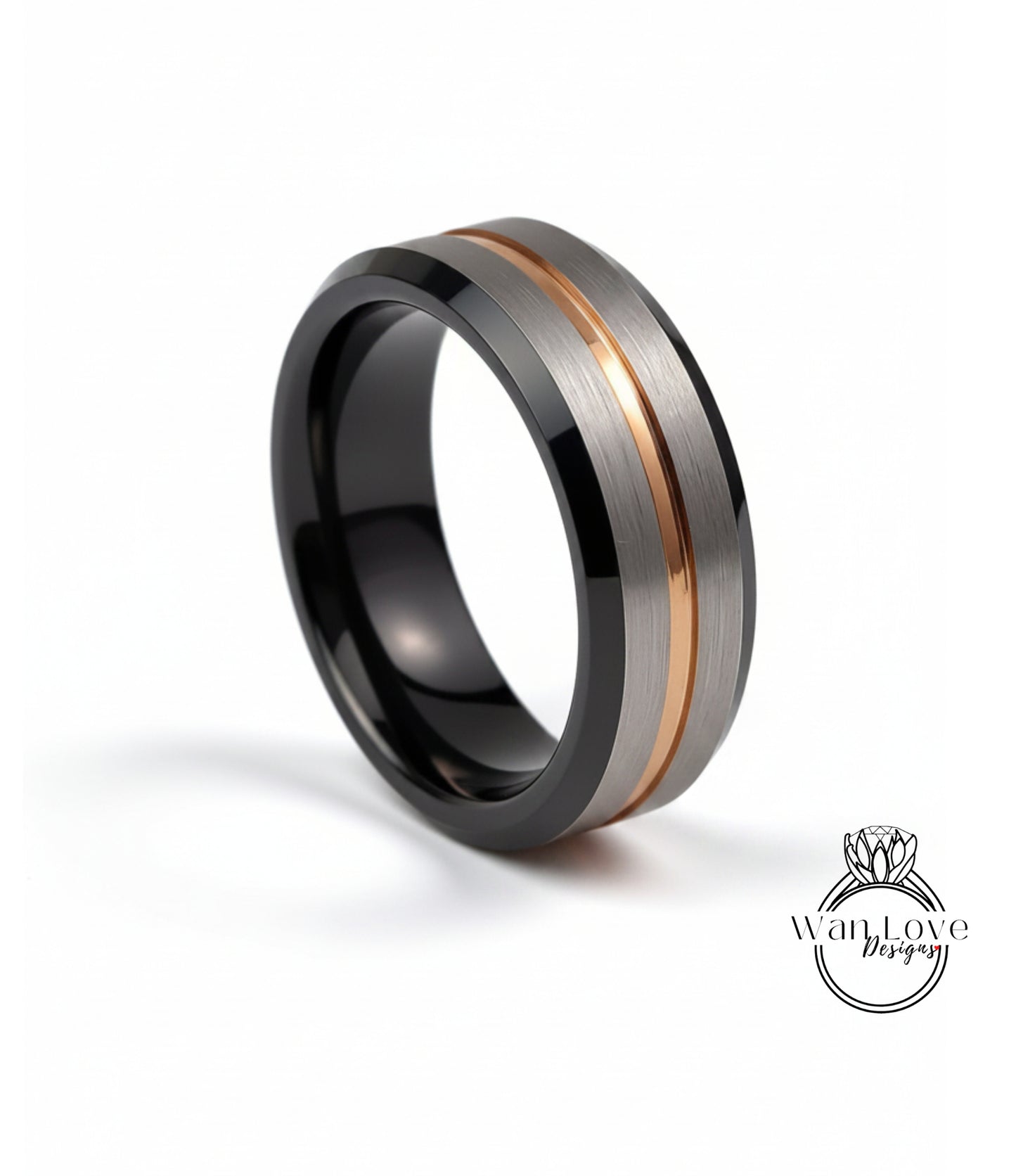 A modern ring with a black and silver band, featuring a thin gold stripe across the middle.