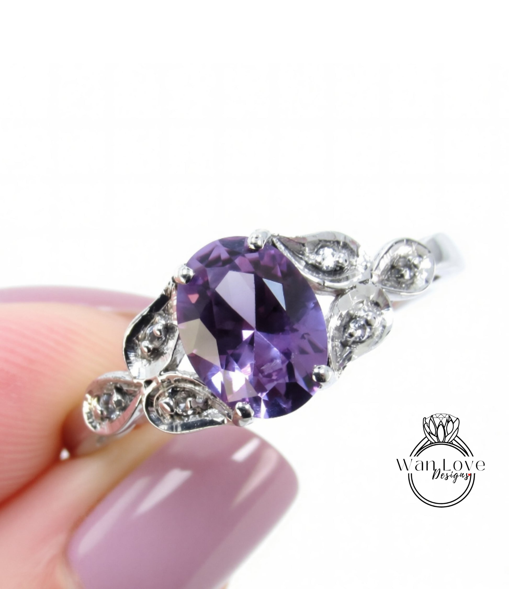 A close-up image of a silver ring with a large oval-shaped purple gemstone, surrounded by smaller diamonds.