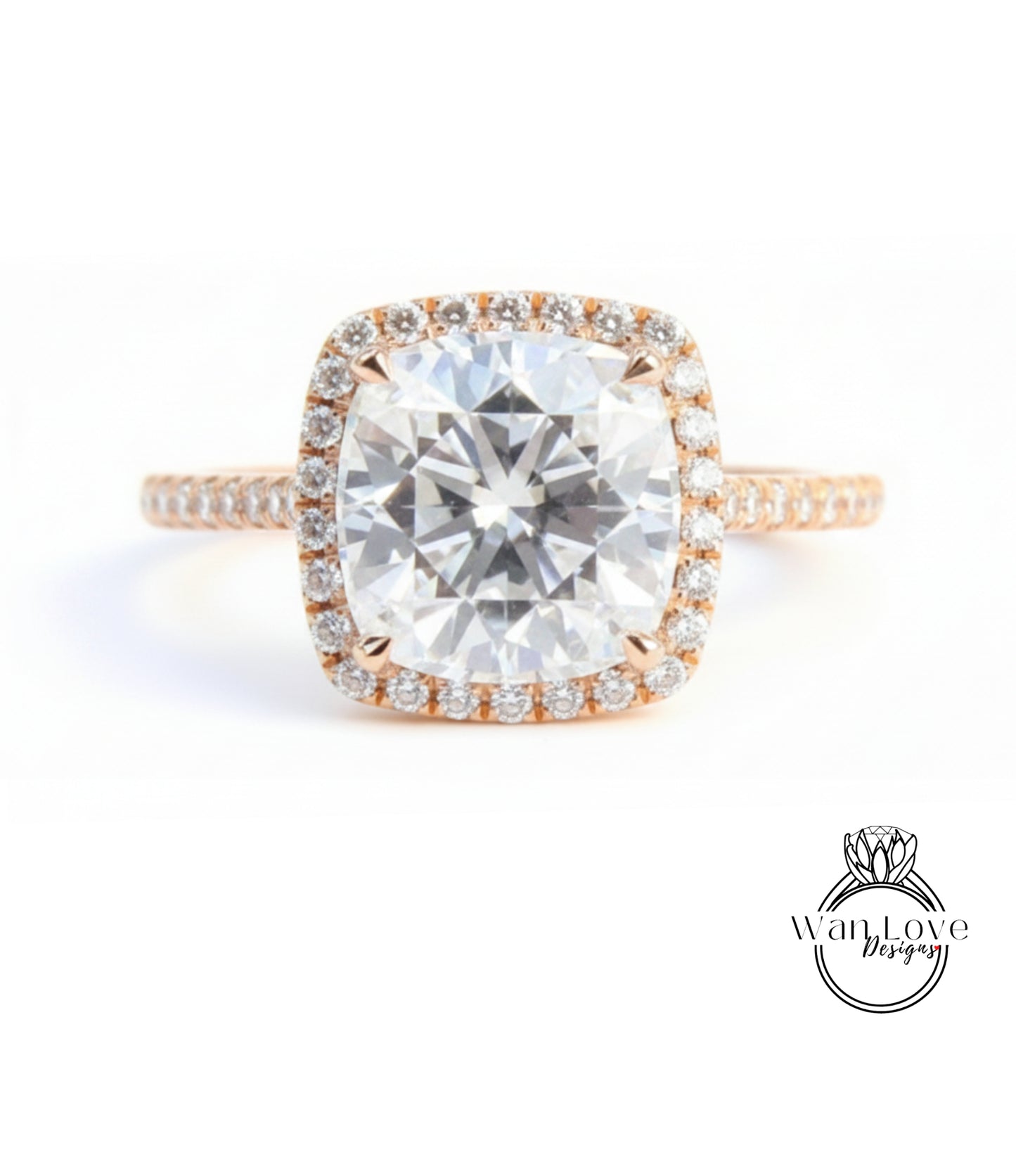 A large, round diamond engagement ring with a halo of smaller diamonds around the center stone.