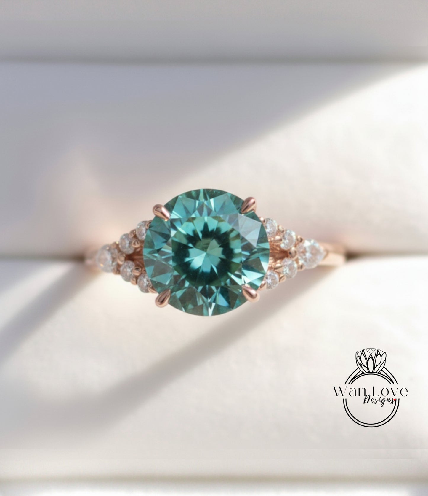 A close-up image of a beautiful engagement ring with a large, round blue gemstone surrounded by smaller diamonds.