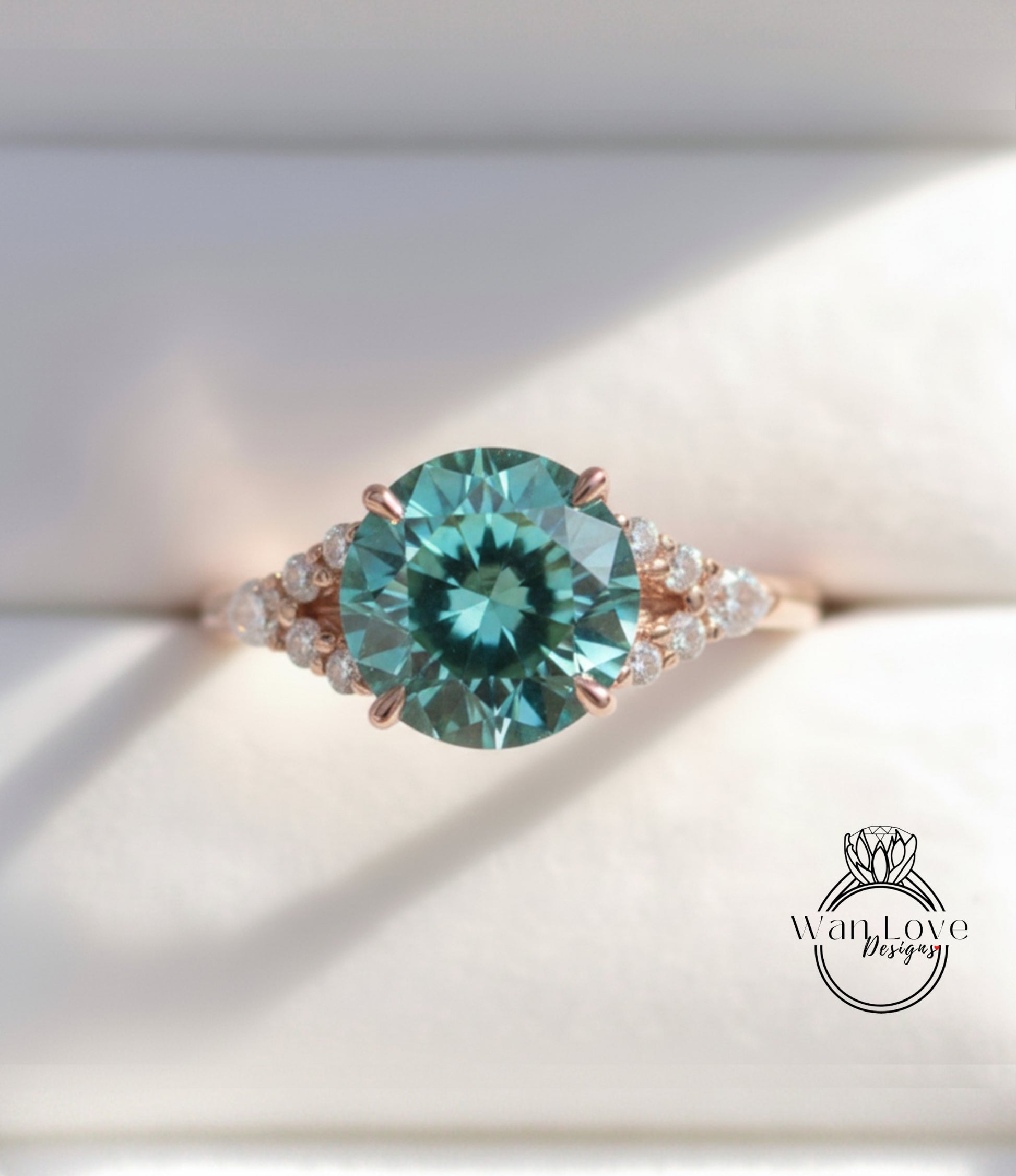 A close-up image of a beautiful engagement ring with a large, round blue gemstone surrounded by smaller diamonds.
