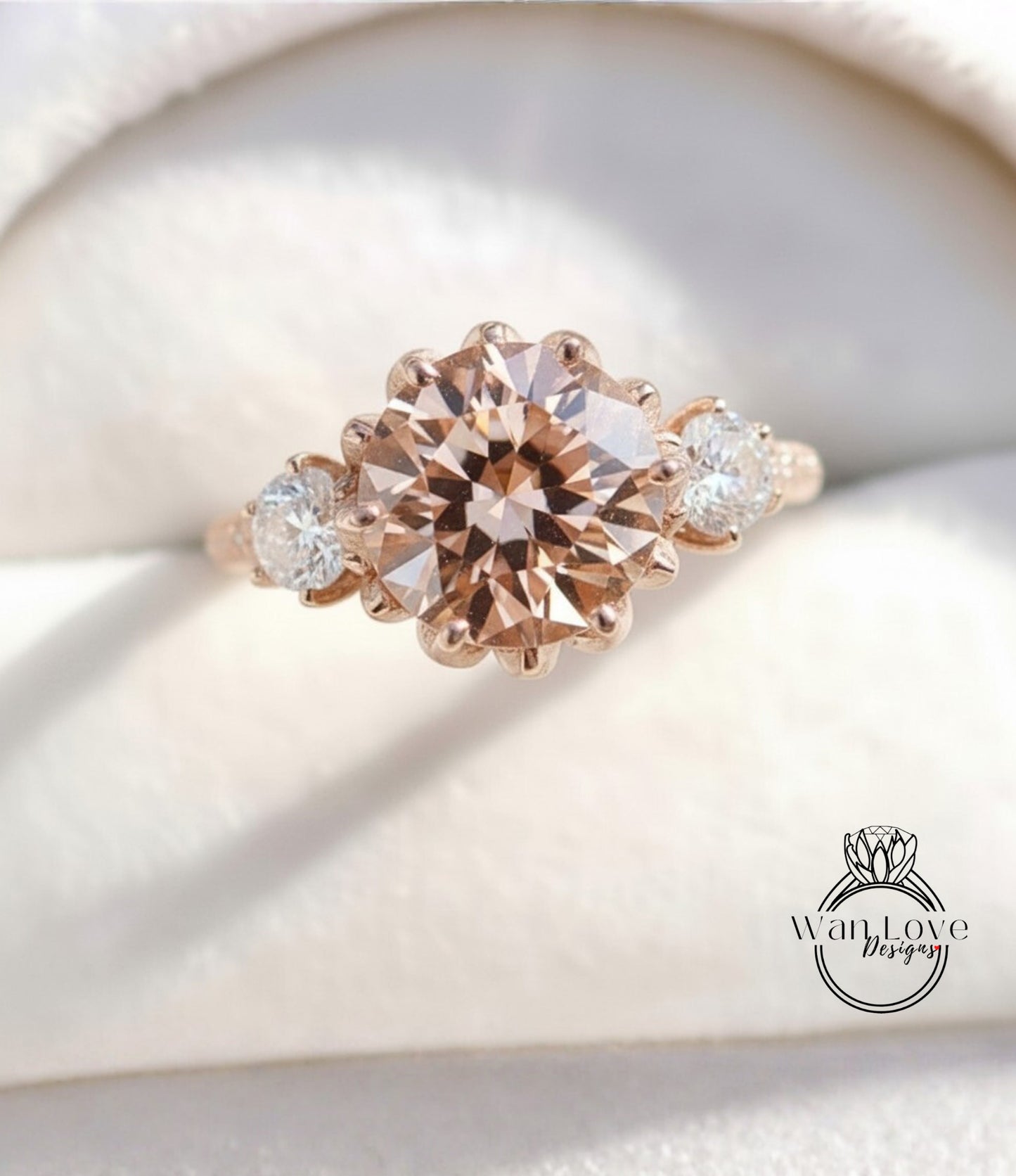 A close-up image of a gold ring with a large, round diamond in the center, surrounded by smaller diamonds on either side.