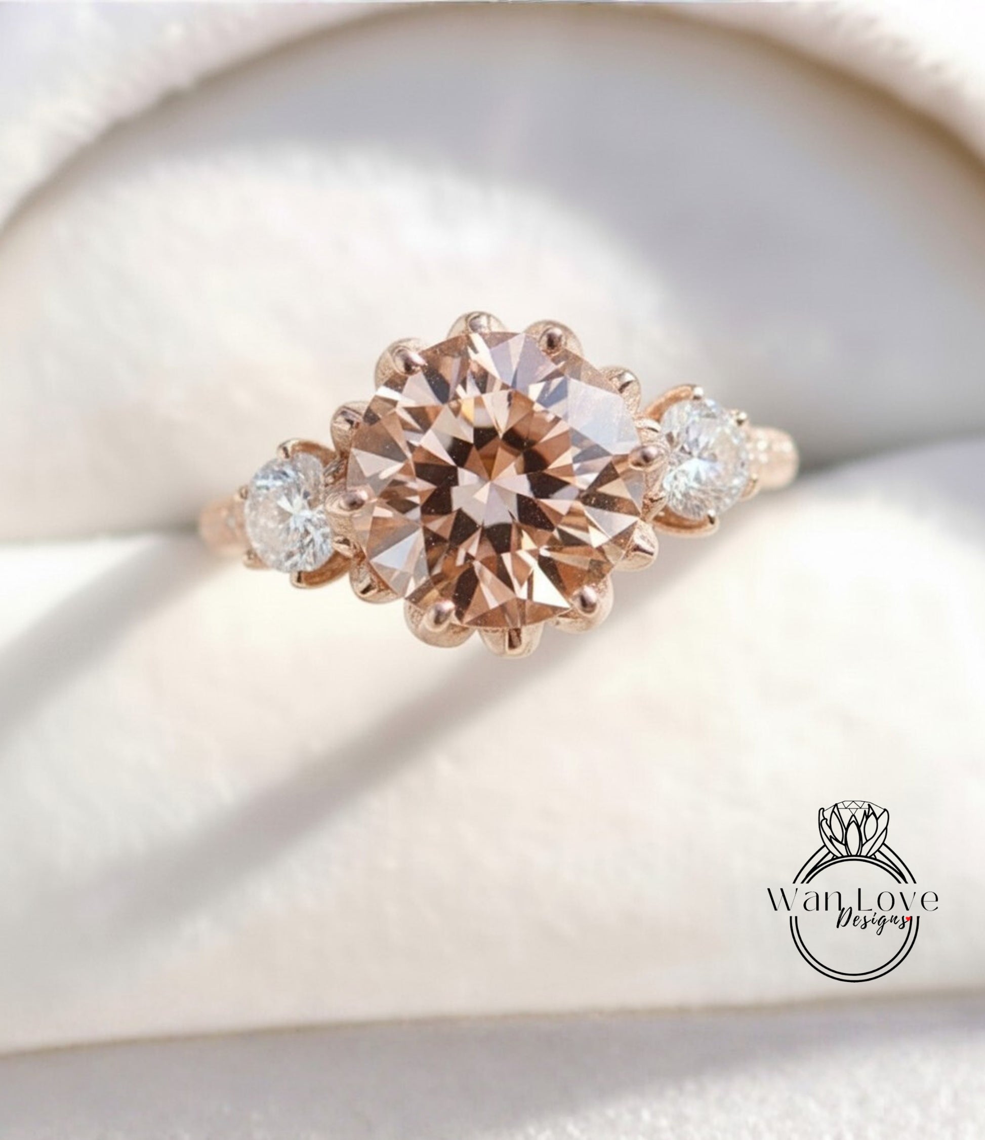 A close-up image of a gold ring with a large, round diamond in the center, surrounded by smaller diamonds on either side.