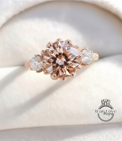 A close-up image of a gold ring with a large, round diamond in the center, surrounded by smaller diamonds on either side.