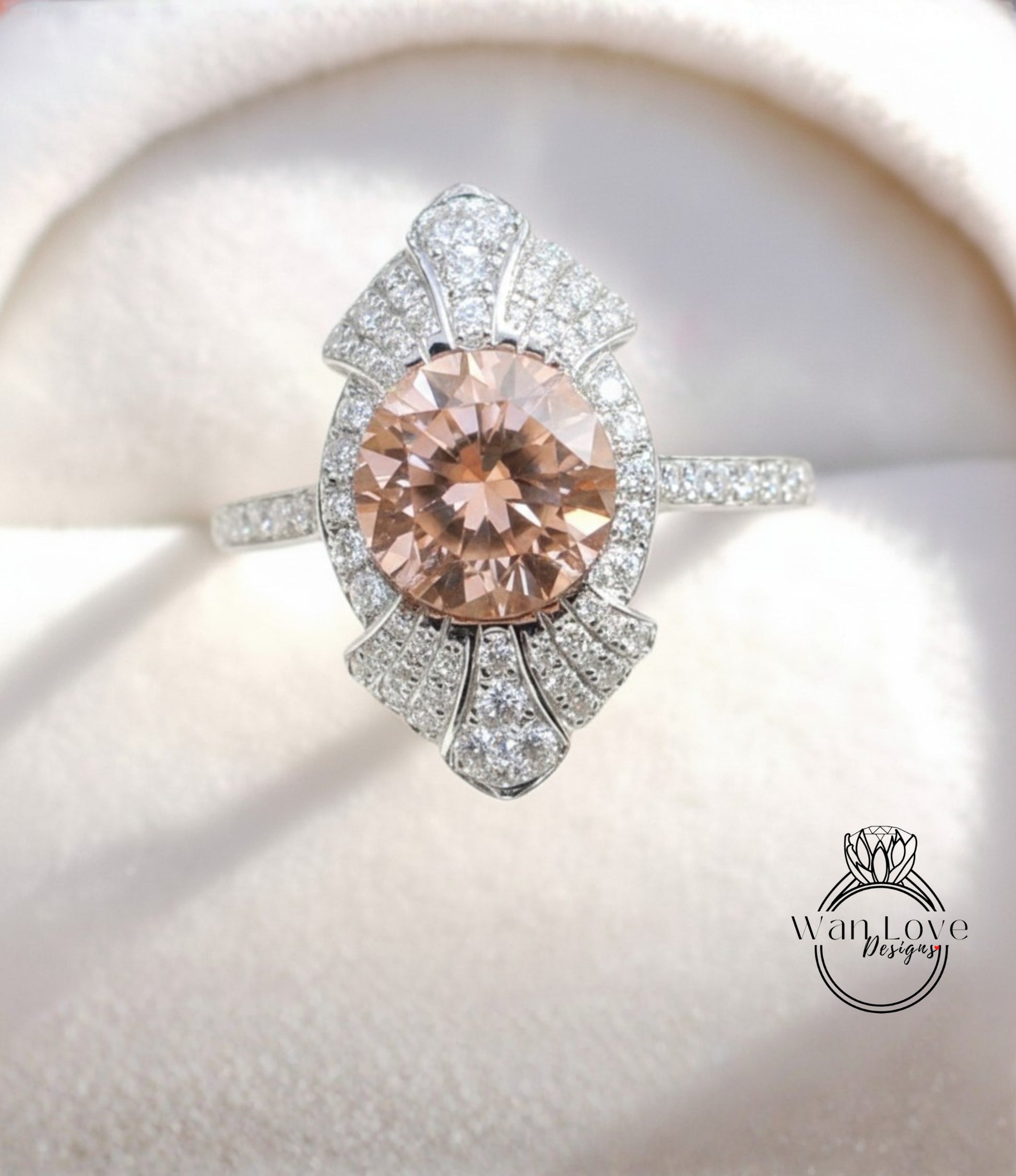 A close-up image of a diamond ring with a large, round-cut pink gemstone surrounded by smaller diamonds.